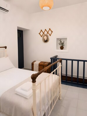 2 habitaciones, tabla de planchar con plancha, wifi y ropa de cama 