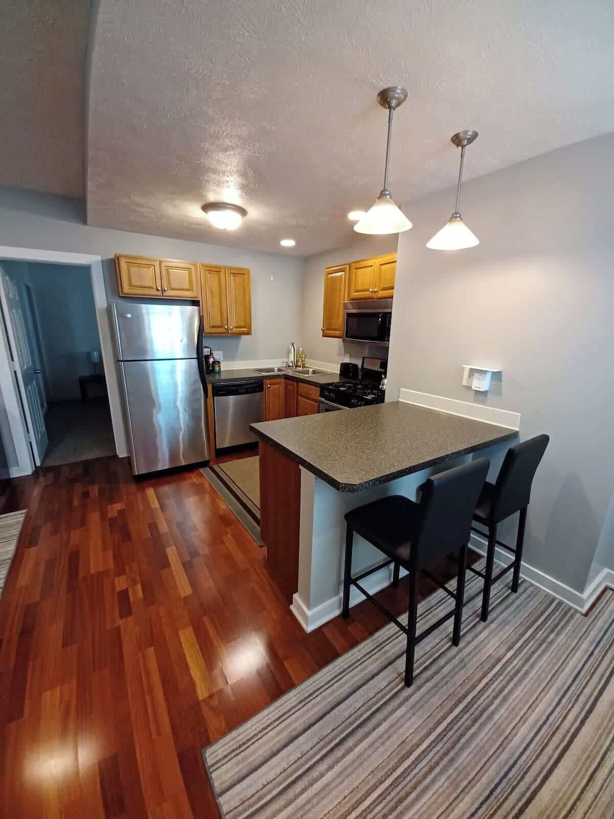 Coffee/tea maker, fridge, microwave, oven