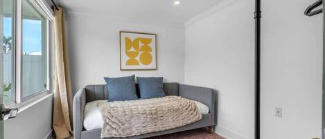 4 bedrooms, desk, iron/ironing board, travel cot
