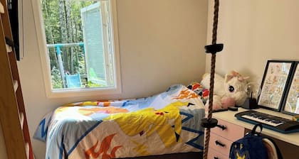Family-friendly forest retreat with hot tub and a 4,000 m² fenced garden