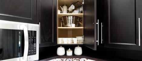 Coffee/tea maker, cookware/dishes/utensils, paper towels