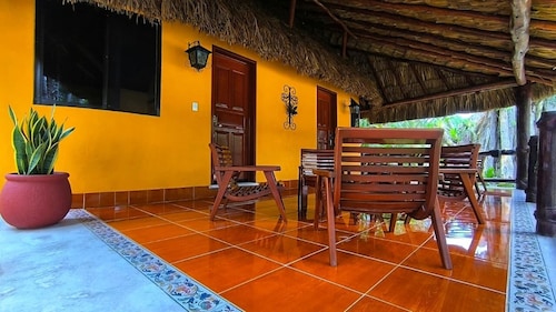 Bungalows by Cenote Ik-Kil 