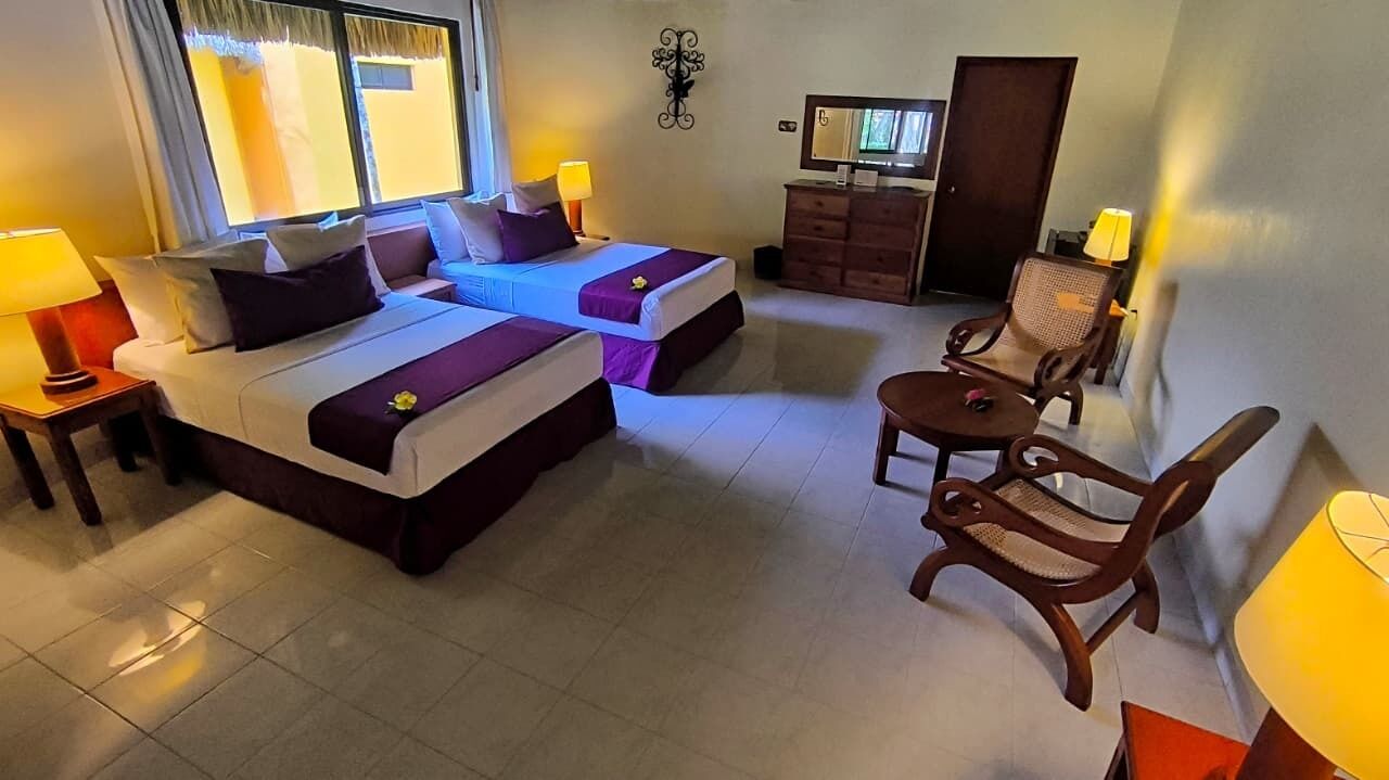 Bungalow Design, 2 lits doubles, vue jardin | Coffres-forts dans les chambres, rideaux occultants