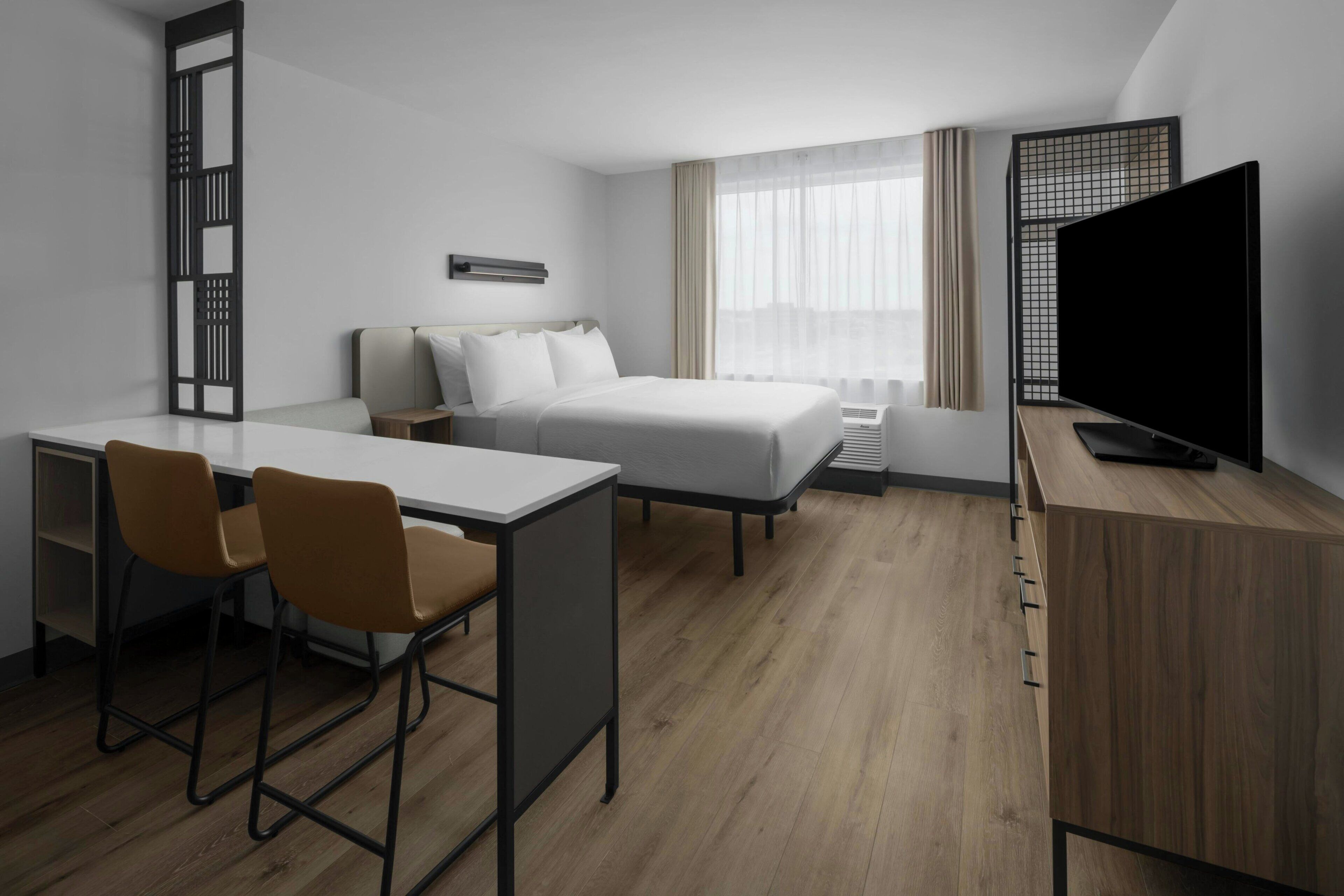 Studio, 1 Queen Bed (No View) | Living area | 55-inch Smart TV with cable channels, Netflix, streaming services