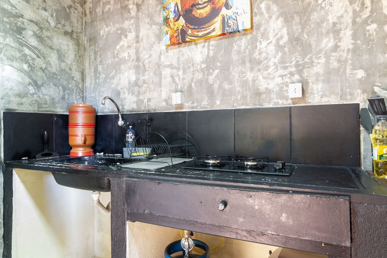 Coffee/tea maker, fridge, toaster, cookware/dishes/utensils