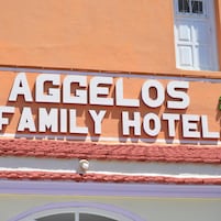 A sign for the Aggeolos Family Hotel.