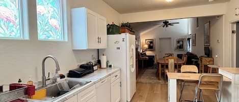 Coffee/tea maker, fridge, microwave, oven