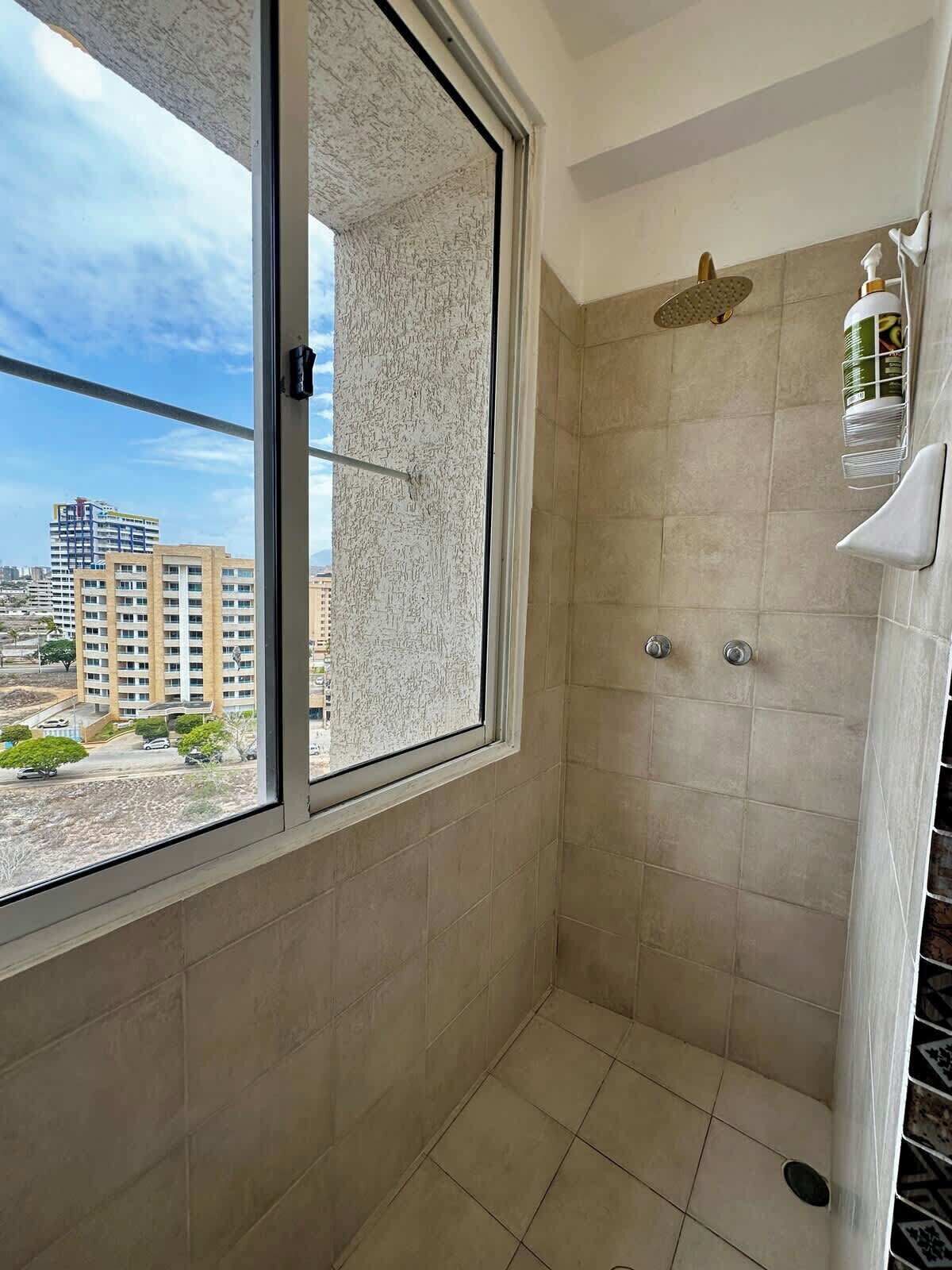 Shower, hair dryer, shampoo