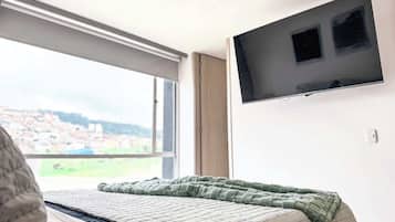 3 habitaciones, tabla de planchar con plancha, wifi y ropa de cama