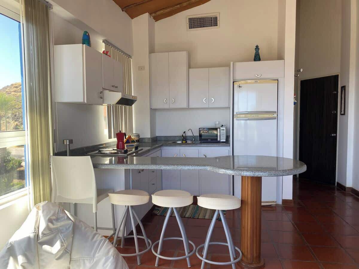 Coffee/tea maker, fridge, microwave, stovetop
