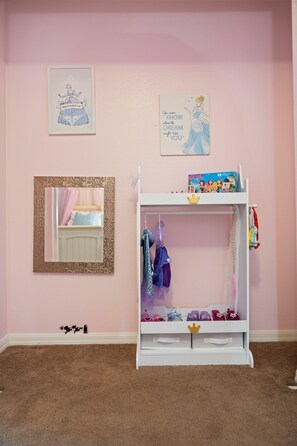 A child's room with a bunk bed, a mirror, and wall decorations. - Reunion Relaxation - Disney/South Pool/Outdoor TV (Kissimmee)