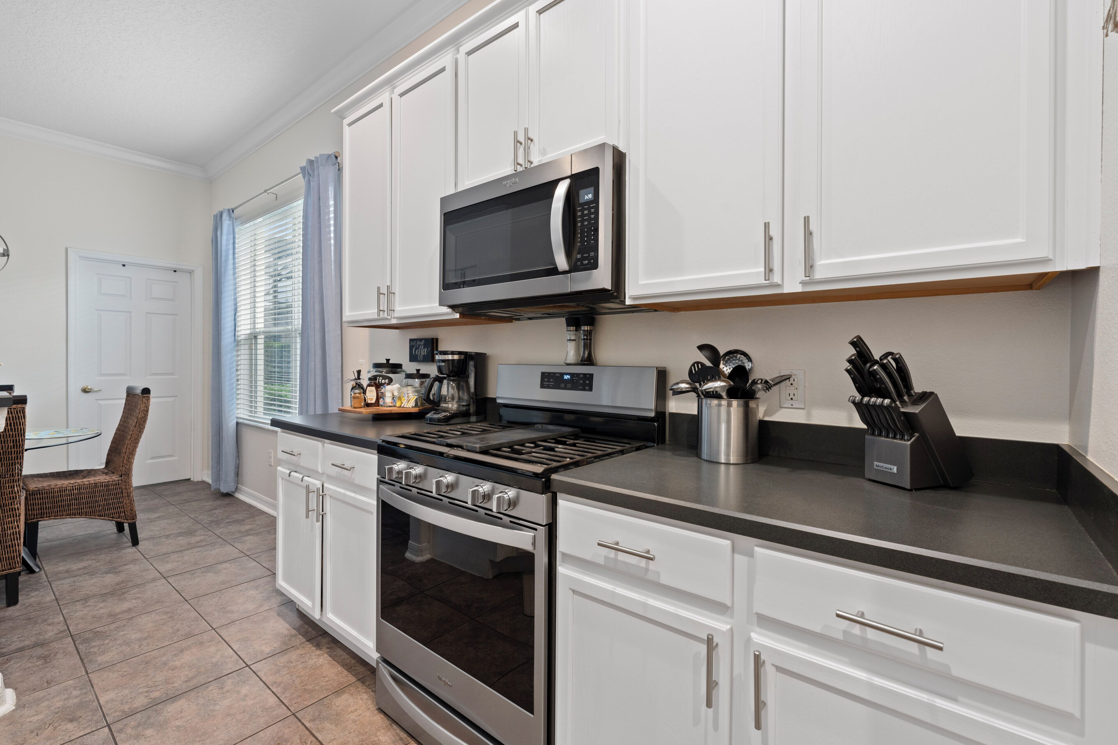 Coffee/tea maker, fridge, microwave, oven