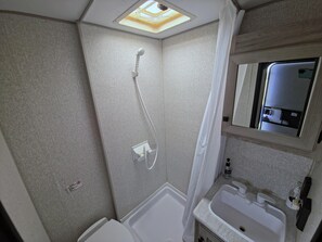Bathroom - Uranus Camper Suite - Planet-themed camper suite with awning deck, sleeps up to four (Penrose)