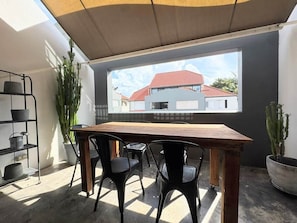 Outdoor dining - Quiet New Farm Retreat w/ Pool & Free Parking (New Farm)