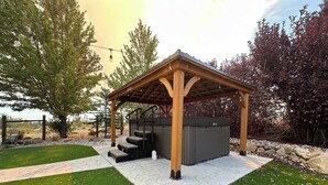 A wooden gazebo with steps leading up to a storage shed. - Reno Retreat - 3BR Oasis w Swim Spa, Hot Tub (Reno)