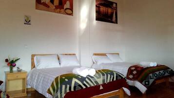 Classic Quadruple Room, Patio, Partial Lake View | Laptop workspace, free WiFi