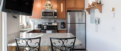 Coffee/tea maker, fridge, microwave, oven