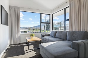 Departamento, vista al parque | Área de sala de estar