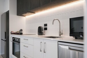 Apartment | Private kitchen | Fridge, electric kettle, toaster