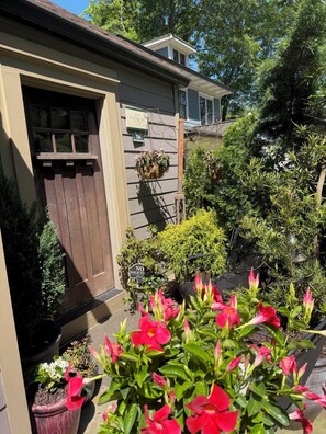 A house with a brown door, a mailbox, and a 'NO Soliciting' sign. - Spacious Craftsman Guest Suite in VA-Highland (Atlanta)