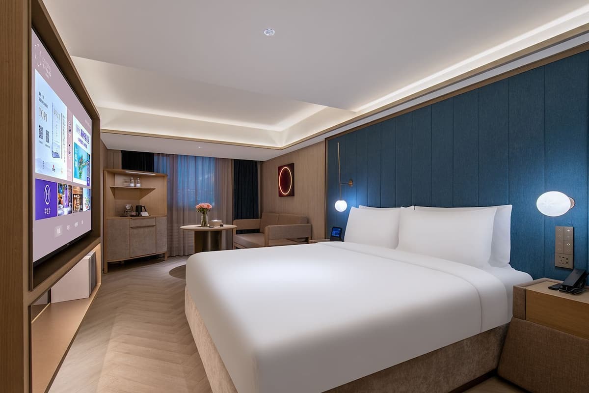 Habitación doble ejecutiva | Edredón, camas con efecto memoria y artículos del minibar gratis