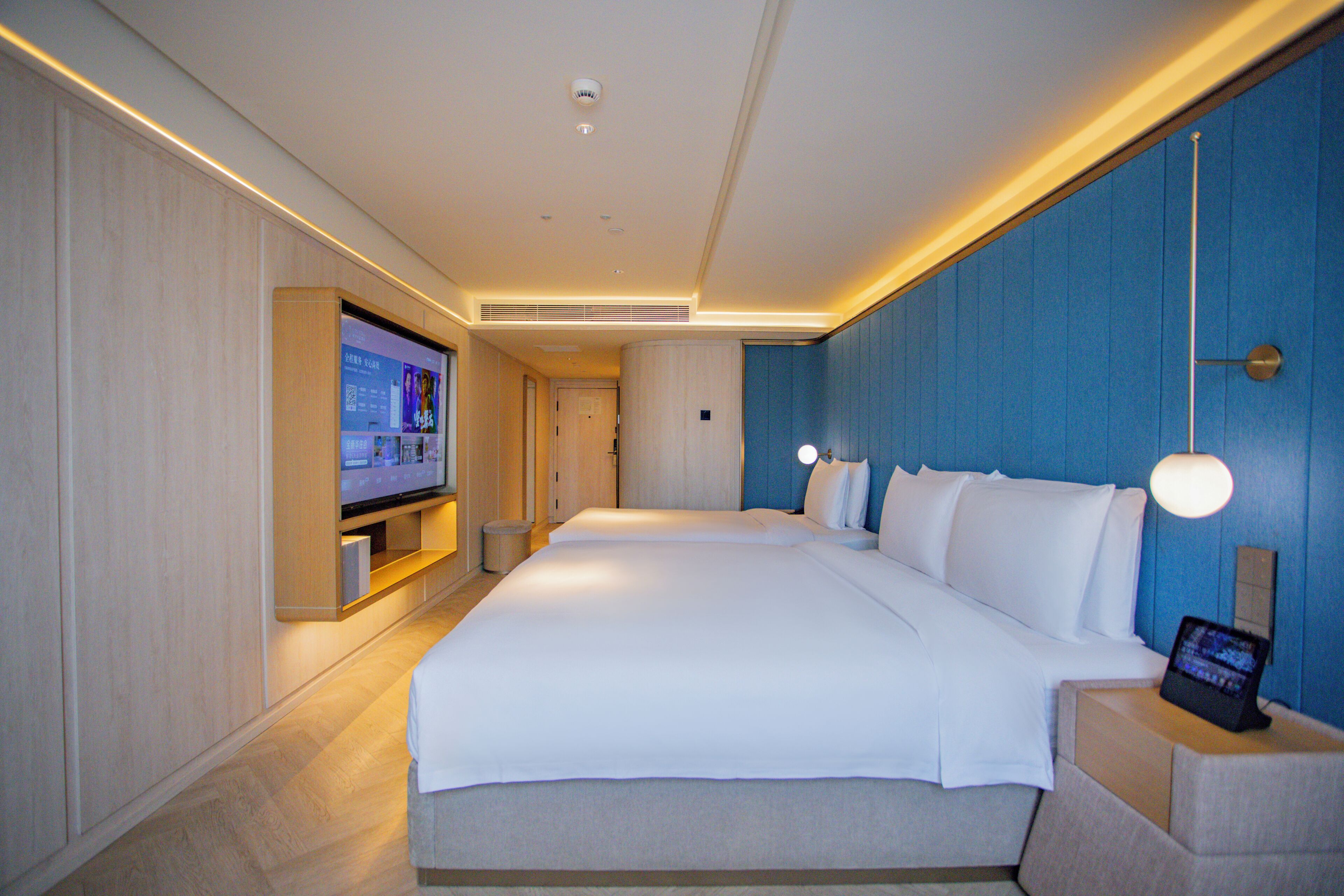 Down duvets, memory-foam beds, free minibar, desk