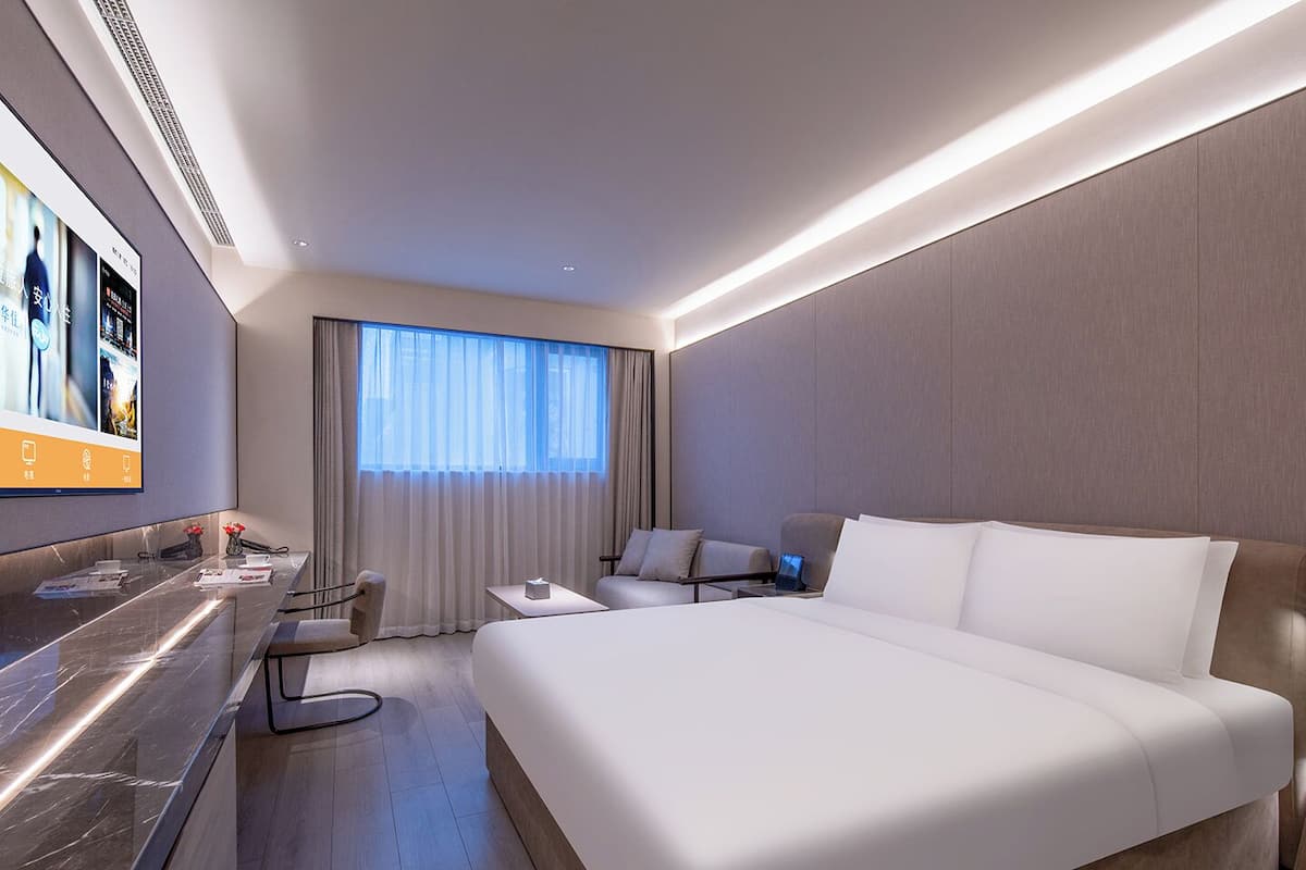 Chambre Double Confort | Draps en coton égyptien, literie de qualité supérieure