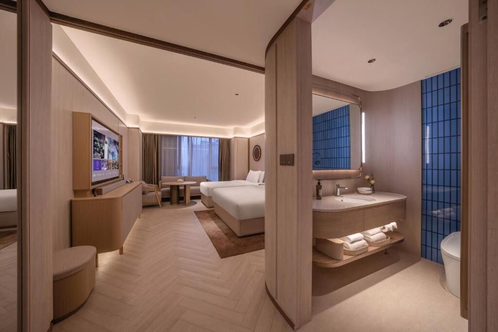 Comfort Triple Room, City View | Free minibar, blackout curtains, soundproofing, free cots/infant beds