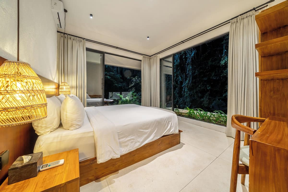 Apartamento com design assinado, 2 quartos, vista para o rio | Cofres nos quartos, Wi-Fi de cortesia, roupa de cama