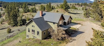 4-bedroom farmhouse in tranquil Ovando with AC comfort