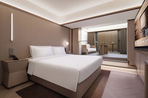 Kamar Double Khas | Selimut bulu angsa, minibar gratis, dan meja kerja