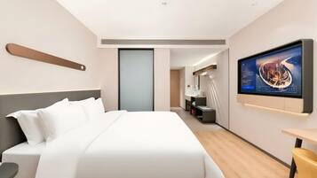 Desk, laptop workspace, free WiFi, bed sheets