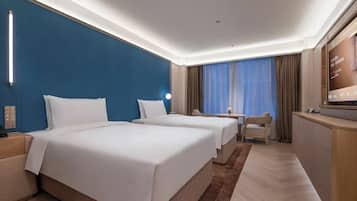 Luxury Twin Room | Minibar (free items), desk, blackout drapes, soundproofing