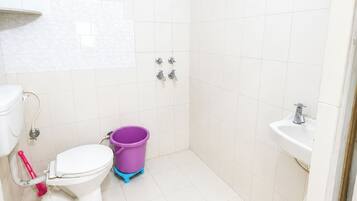 Shower, rainfall showerhead, slippers, towels
