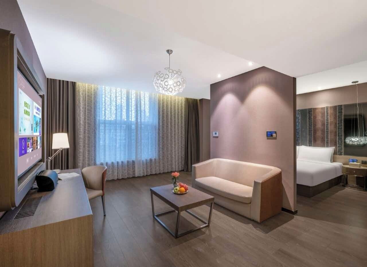 Dundyner, minibar (inkludert), skrivebord og blendingsgardiner