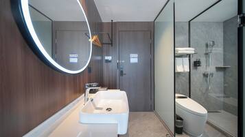 Shower, free toiletries, hair dryer, slippers
