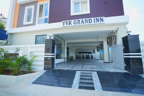 The entrance to a building with a sign reading 'VVK GRAND INN'. - YVK GRAND INN Hitech City (Hyderabad)