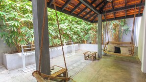 Superior Dorm Shared with Kima Surf Guiding Package | Terrace/patio