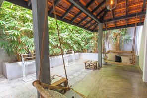 Superior Dorm Shared with Kima Surf Guiding Package | Terrace/patio