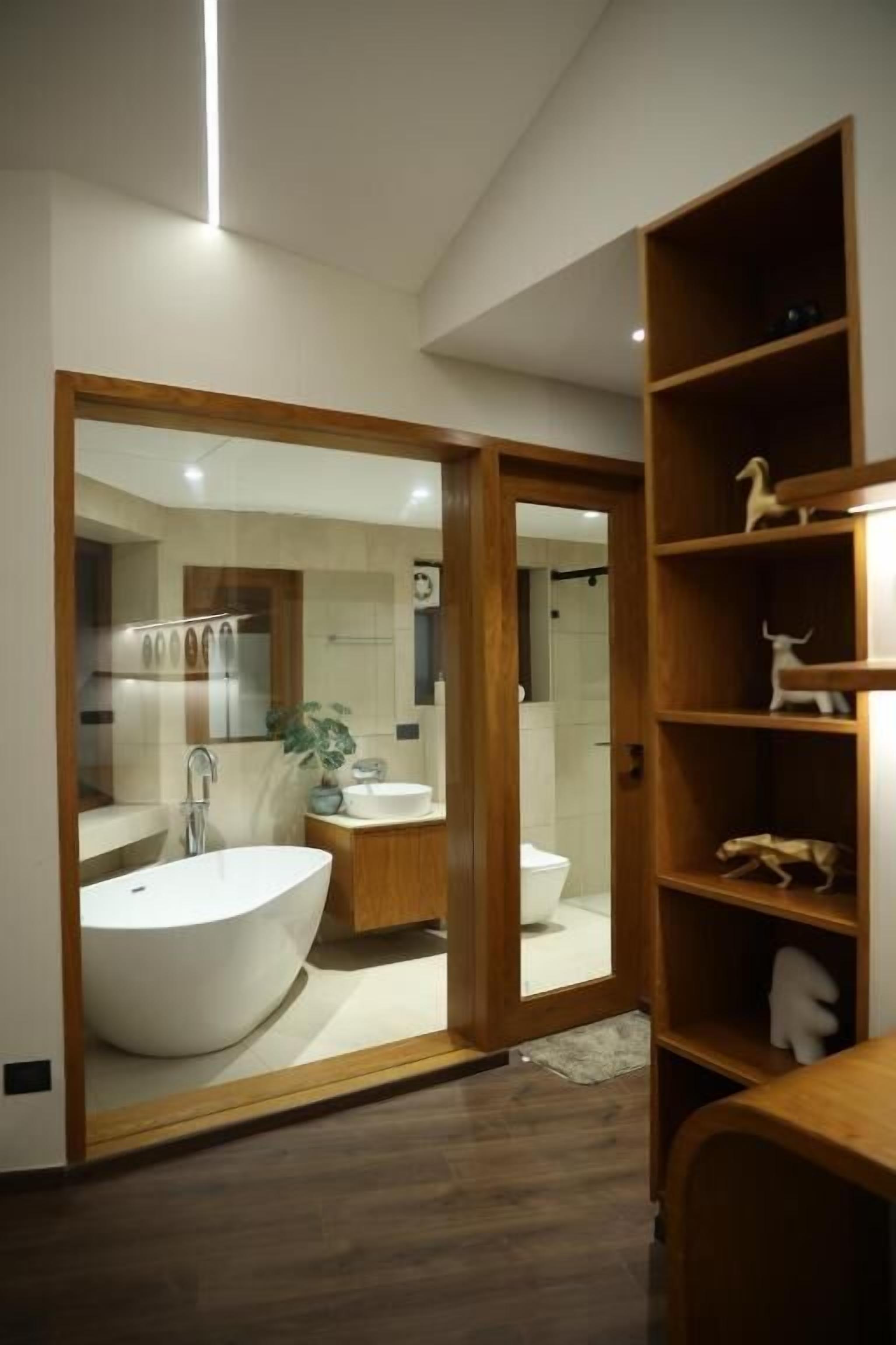 Separate bathtub and shower, towels, soap, shampoo