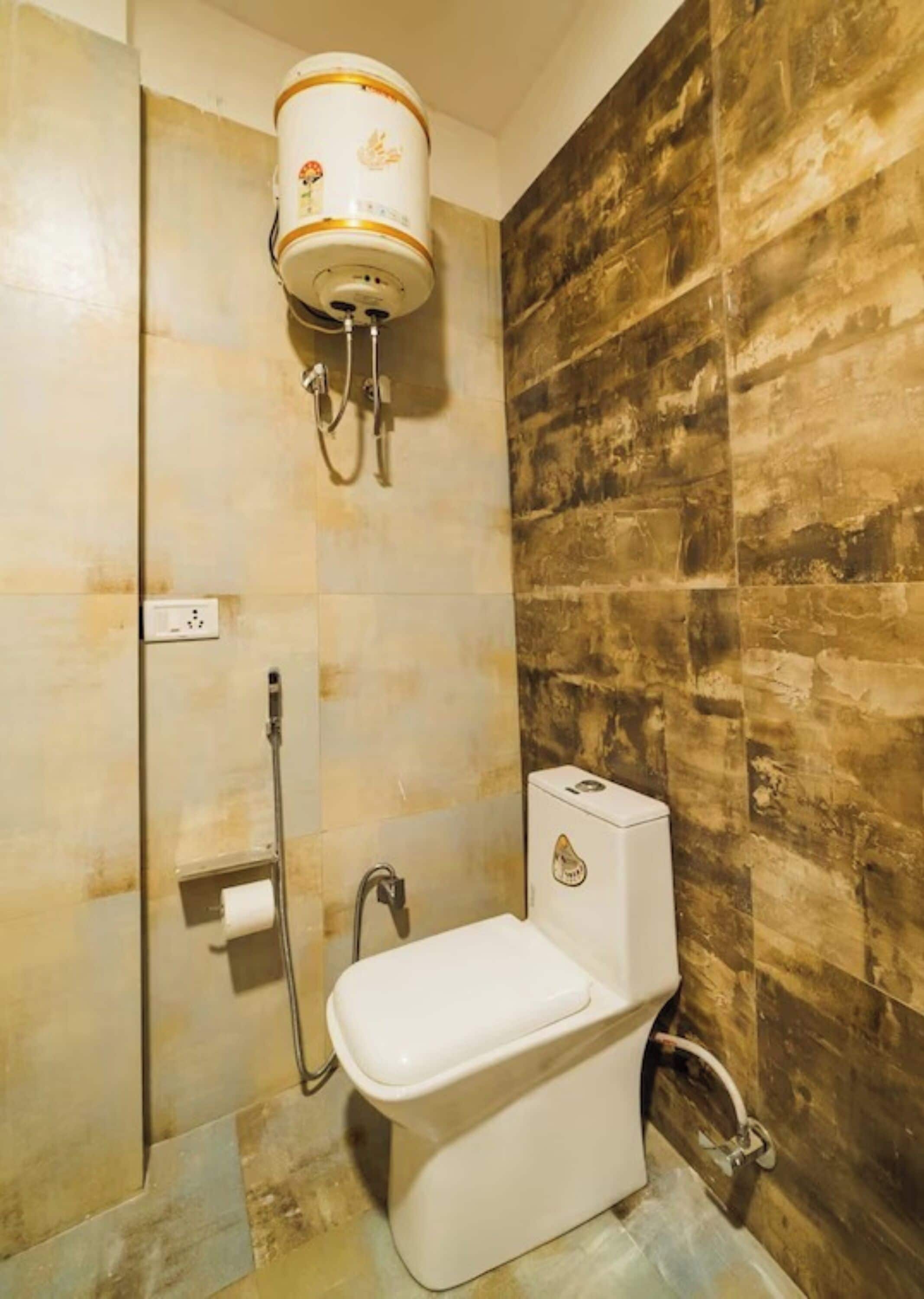 Shower, rainfall showerhead, slippers, towels