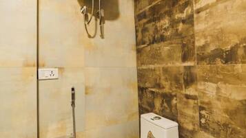 Shower, rainfall showerhead, slippers, towels