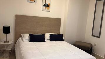 2 dormitorios, tabla de planchar con plancha, Internet y ropa de cama