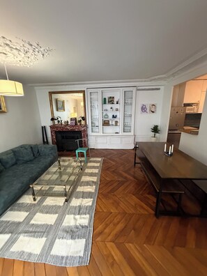 Living area - A stunning, quiet, and cozy Haussmann-style apartment between the Marais and the Canal St. Martin (Paris)