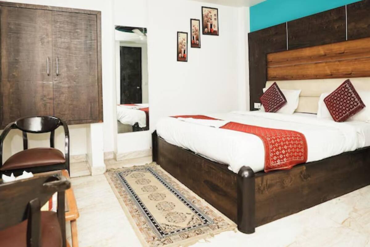 Habitación doble, balcón, vista al océano | Caja de seguridad en la habitación y escritorio