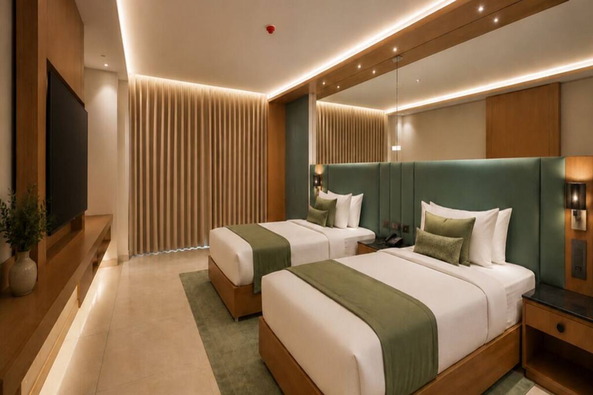 Executive Twin Room | In-room safe, laptop workspace, blackout drapes, soundproofing