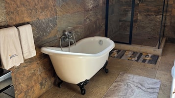 Jetted tub, hair dryer, towels, soap