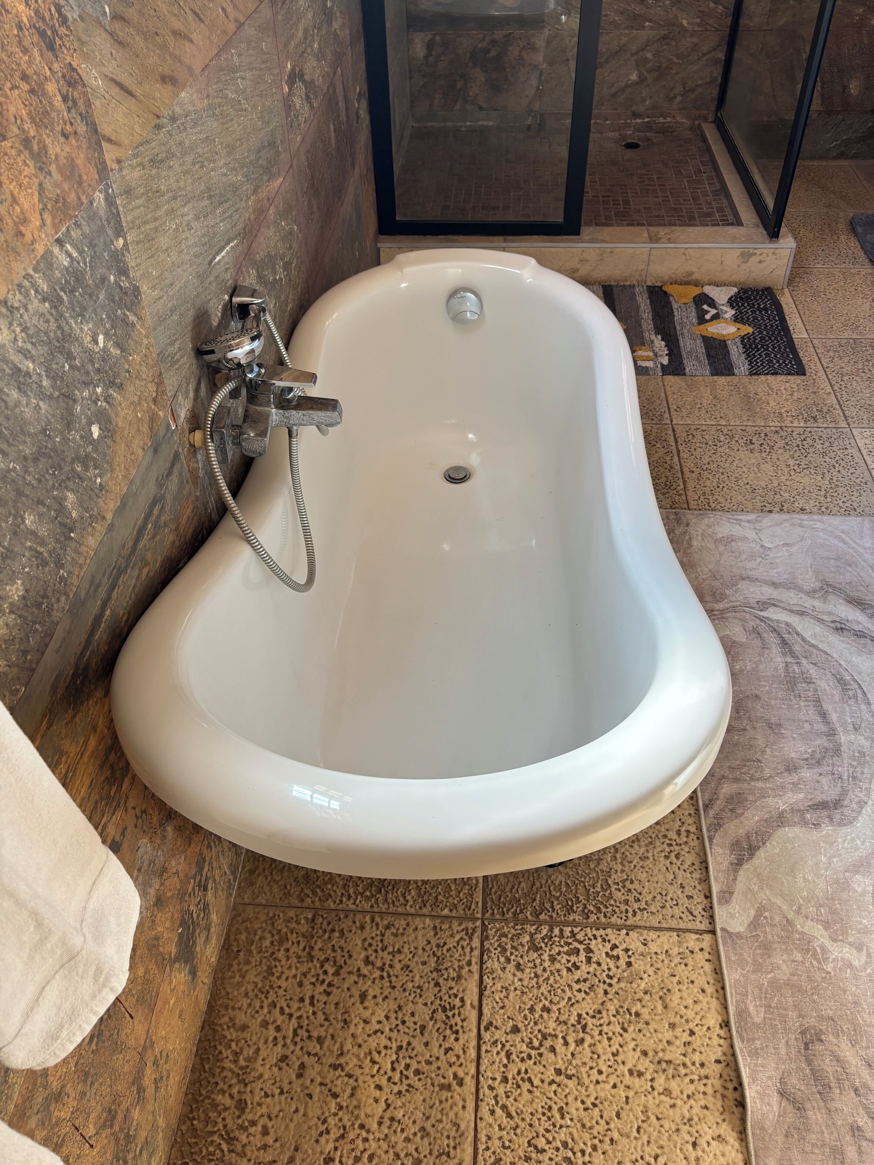 Jetted bath, hair dryer, towels, soap