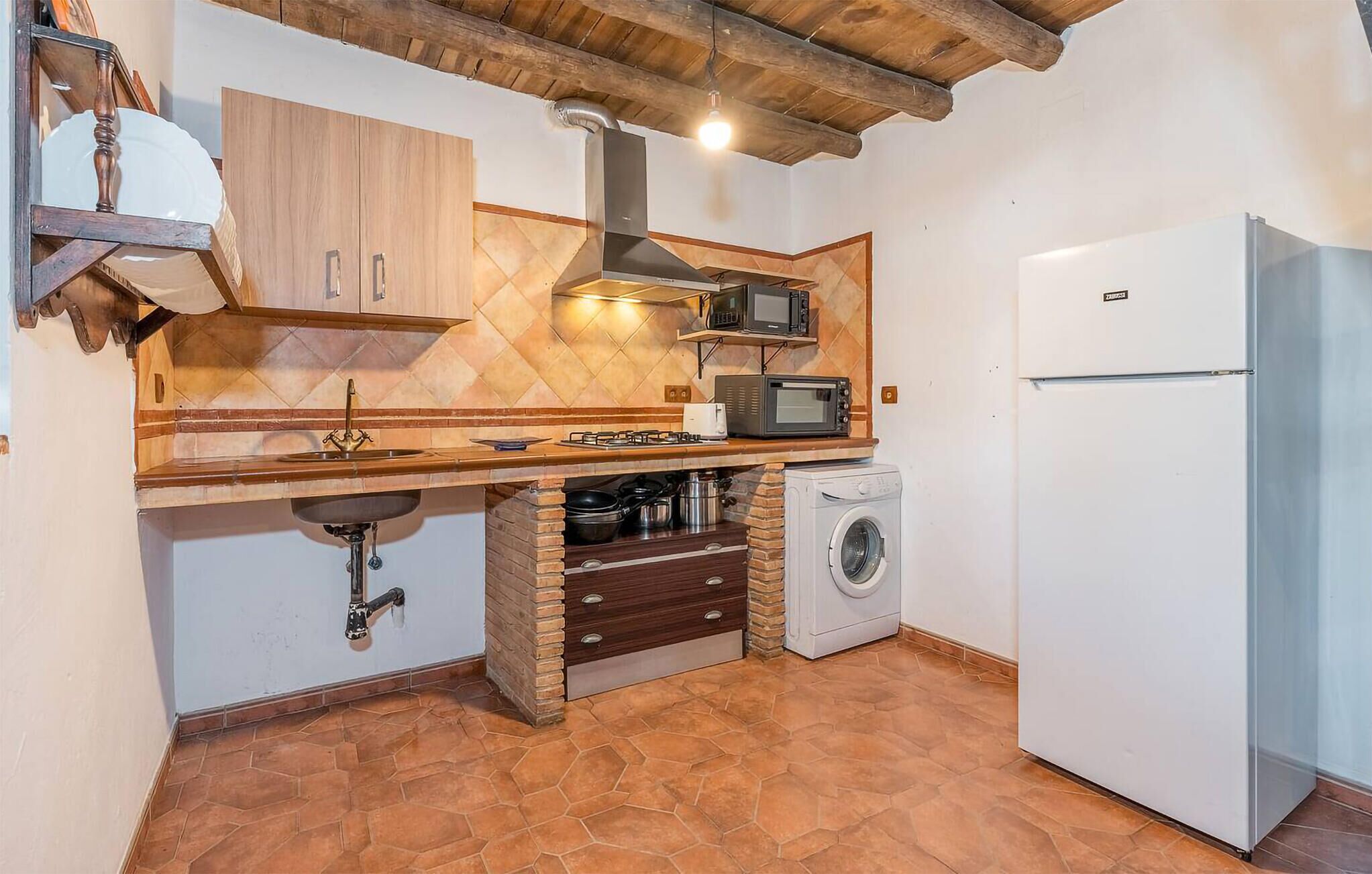 Coffee/tea maker, fridge, microwave, oven