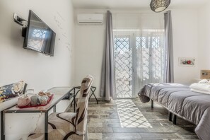 Habitació doble o amb dos llits individuals, balcó | Wifi gratuïta 
